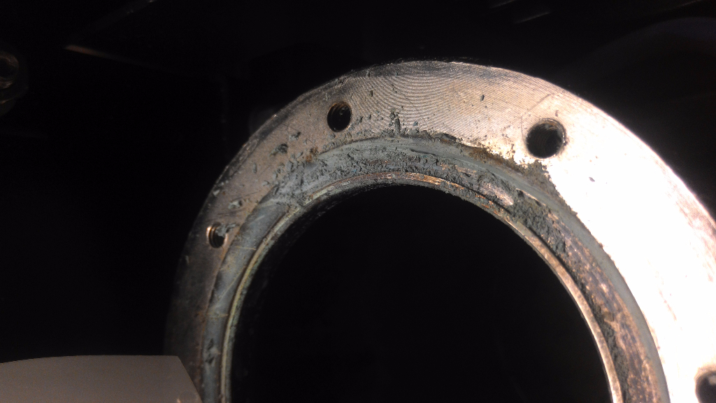 Shows melted fused oem gasket