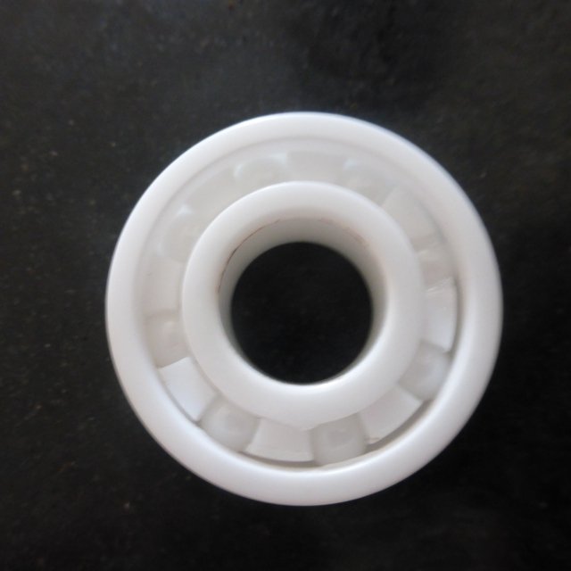 Zirconia bearing . (open end) face this side towards motor