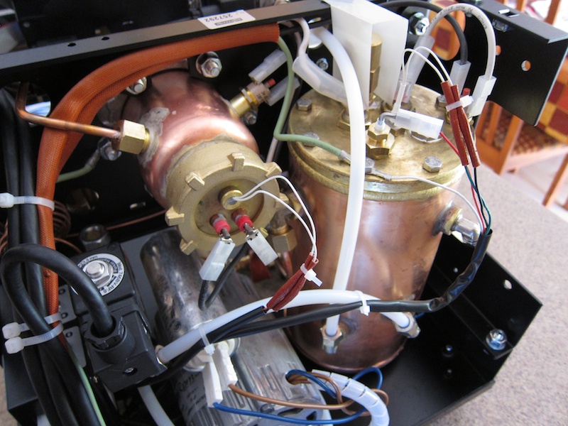 Rear view of the non plated copper boilers with brass ends.